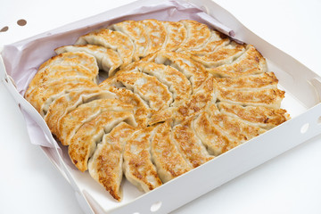 asian dumplings gyoza potstickers fried, dumplings snack in carry box