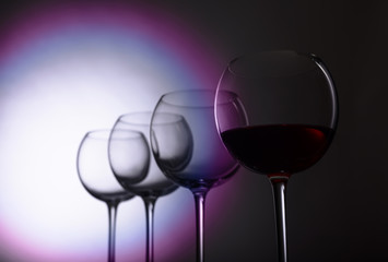 Glasses of red wine.