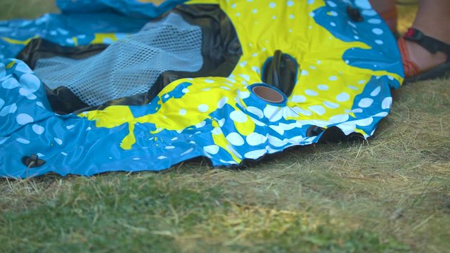 Inflating an Inner Tube in the Grass.  Shot on a Blackmagic Ursa Mini Pro 4.6k with a Sigma 50-100mm f/1.8.