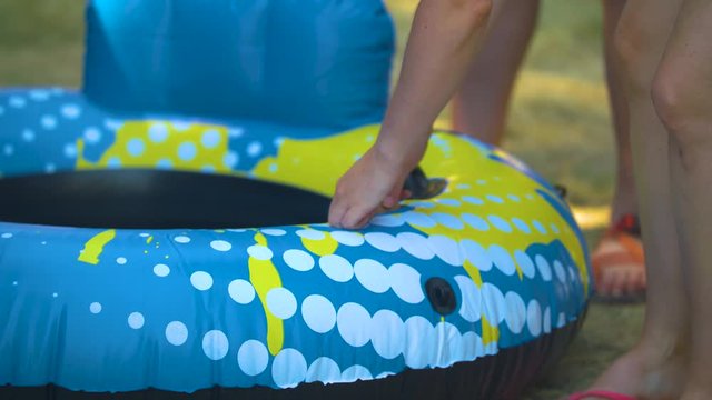 Testing an inner tube for inflation and taking it away.  Shot on a Blackmagic Ursa Mini Pro 4.6k with a Sigma 50-100mm f/1.8.