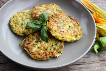 Pancakes from zucchini with parsley