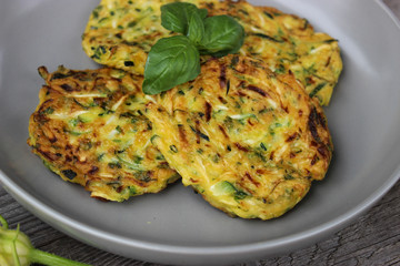 Pancakes from zucchini with parsley