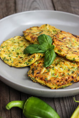 Pancakes from zucchini with parsley