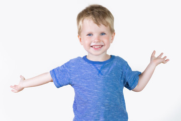Portrait of cheerful kid boy showing something big with his hands - isolated over white background