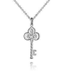 Jewelry golden pendant with diamonds, key, golden chain, white gold, isolated on white