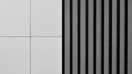 steel battens and square metal wall. - monochrome