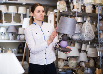 Woman buying new lamp
