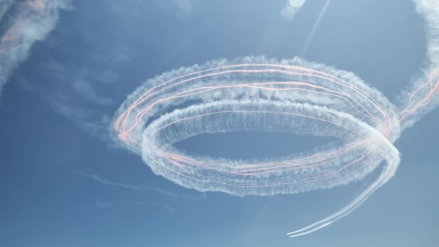 Amazing plane stunt with aeral foggy footprint in the blue sky, difficult pilot job, air show elements