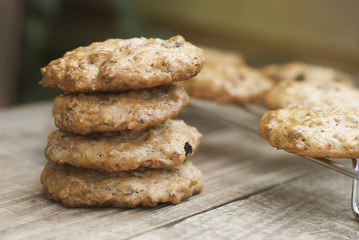 Homemade oat meal cookies or biscuits on wooden rustic board. Sweet dessert snack, Healthy Food. Copy space.