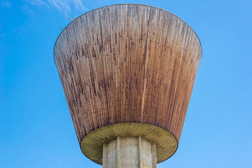 Wooden Water Tower, blue sky on background