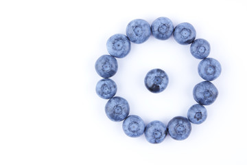 Blueberries on white background, blueberry berries isolated, blue berries close-up, blank for designer, vegetarian food for breakfast, blue fruits for smoothies