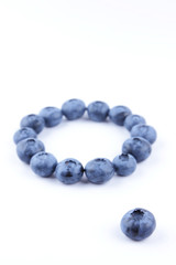 Blueberries on white background, blueberry berries isolated, blue berries close-up, blank for designer, vegetarian food for breakfast, blue fruits for smoothies