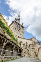 Sighisoara Clock Tower view on a sunny summer day with beautiful colors from this UNESCO World Heritage site