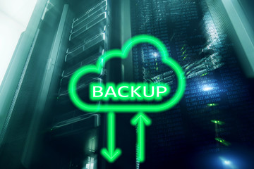 Backup button on modern server room background. Data loss prevention. System recovery.