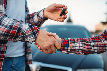 Driving instructor gives car key to female student