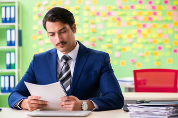 Businessman with many conflicting priorities   