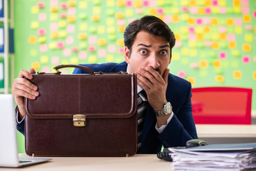 Businessman with many conflicting priorities   