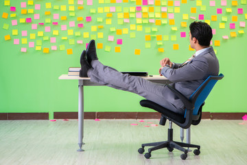 Businessman with many conflicting priorities   