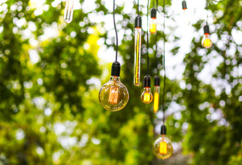 electric lamps outdoors. Lamps of Edison with a beautiful spiral