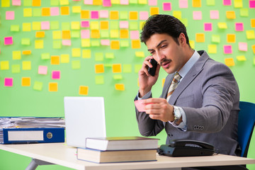 Businessman with many conflicting priorities   