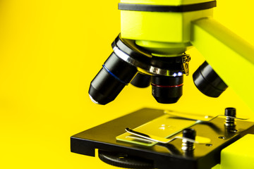 Microscope on white background