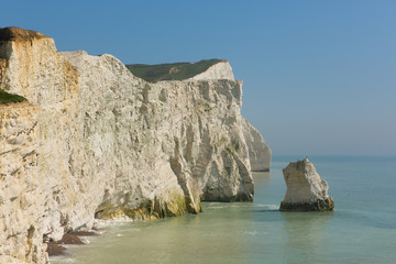 Fototapeta premium Stunning UK coast Seaford East Sussex Southern England with beautiful white chalk cliffs and turquoise sea