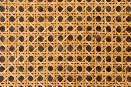 Close up of the pattern formed by open weave rattan cane