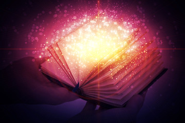 An open magic book on a dark abstract background.