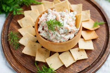 Foto op Canvas Smoked salmon and cream cheese dip with crackers © filirochka