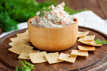 Smoked salmon and cream cheese dip with crackers - obrazy, fototapety, plakaty