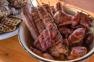 Lulya-kebab. Shish kebab on a stick, stuffing. Traditional Caucasian dish. Shish kebab pieces. On an iron plate.