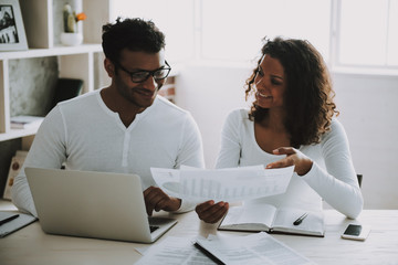 Pakistani Freelancer with Wife Working at Home.