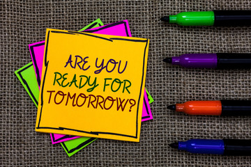 Text sign showing Are You Ready For Tomorrow question. Conceptual photo Preparation to the future Motivation Written on some colorful sticky note 4 pens laid in rank on jute base.