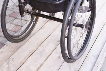 Wheelchair on the wooden ramp Disability Mobility Chair