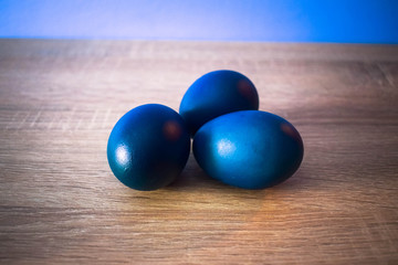 Easter Eggs on Wooden Background