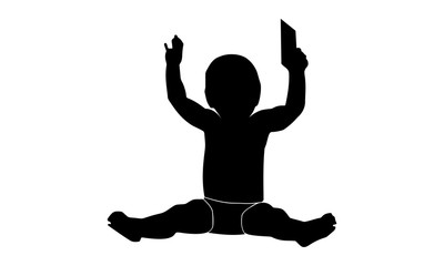 silhouette of the expression of the pleasure of a toddler boy while sitting