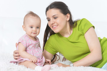young woman with  baby girl