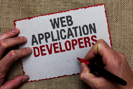 Word writing text Web Application Developers. Business concept for Internet programming experts Technology software On jute ground human hand written some texts on red bordered paper.