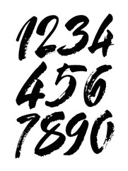 set of calligraphic acrylic or ink numbers. ABC for your design, brush lettering on a black background