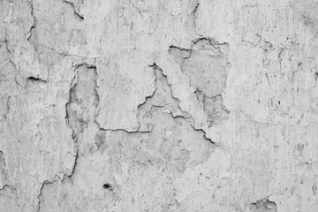 Wall fragment with scratches and cracks