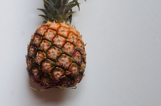 Cropped Image Of Pineapple Against White Background