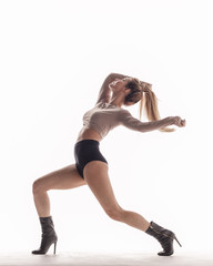 Beuatiful female dancer. White background