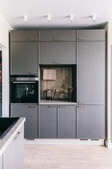 Scandinavian interior design. White grey wooden kitchen room organization