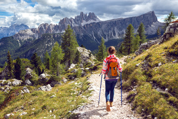 Fototapeta premium tourist girl at the Dolomites