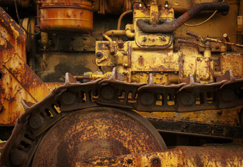Closeup of Vintage Treads From an Old Caterpillar Tractor. A dilapidated old piece of machinery makes for an interesting graphic background.