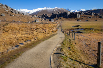 The track leads up the valley to the castle like rock formations 
