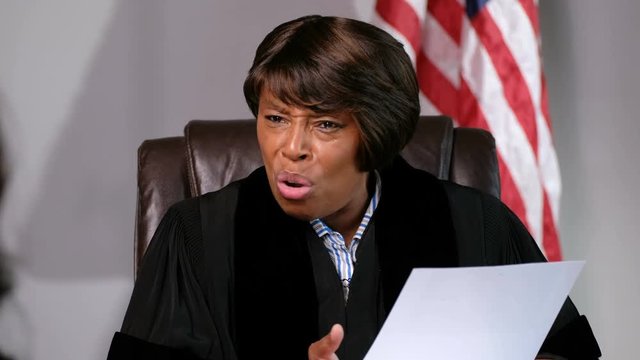 Female Judge expressing concern in courtroom