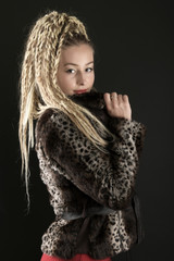 Beautiful woman with braids hairstyle. Dancehall dancer.