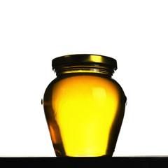 Honey jar isolated on white background
