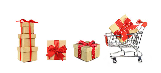 Christmas gift shopping. Christmas shopping cart and gifts isolated on white background